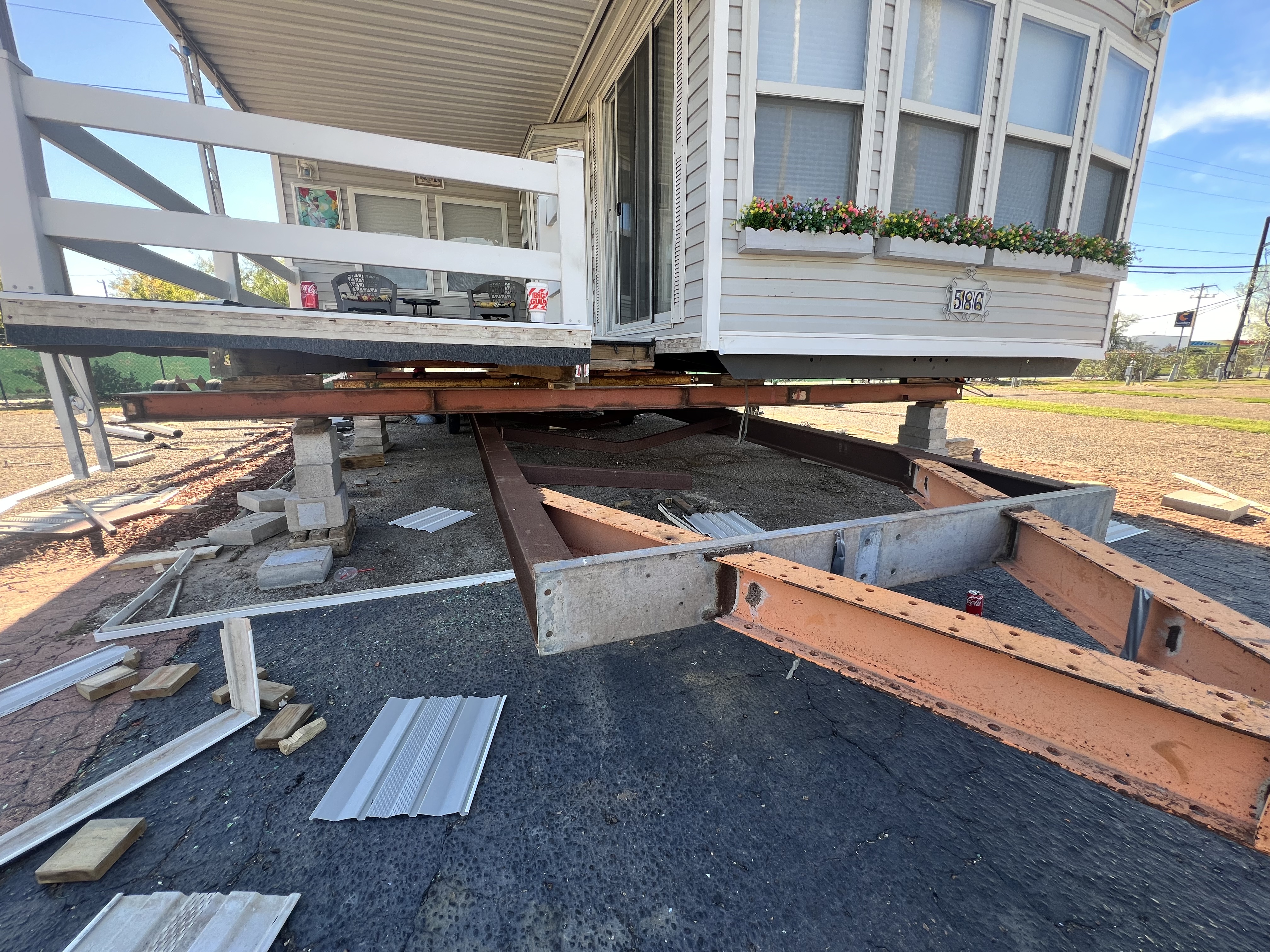 Mobile home loaded on a transport trailer